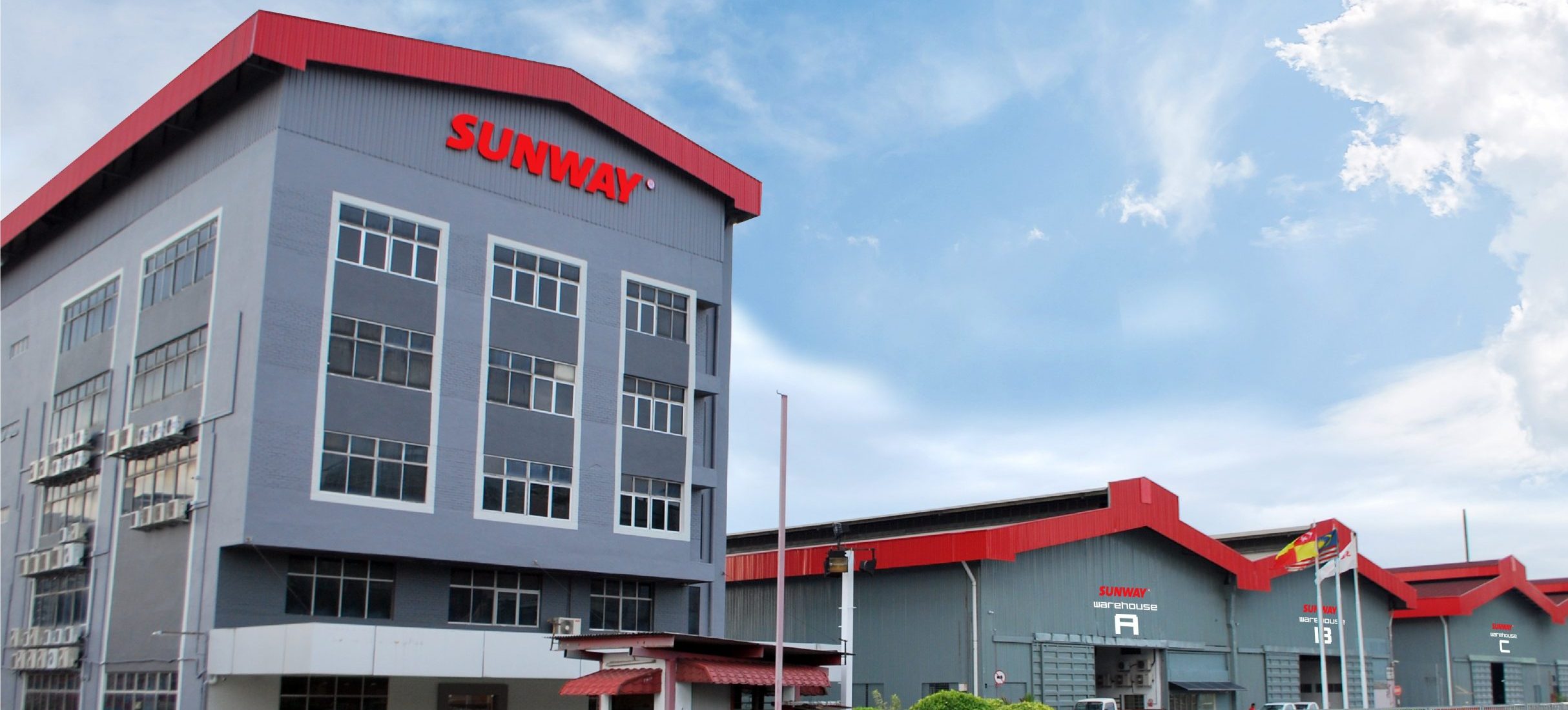 SUNWAY Trading & Manufacturing warehouse in Subang USJ, Selangor, Malaysia, storing heavy equipment parts including engine replacement parts, lubricants, grease, undercarriage parts, wear parts, truck and bus tyres.